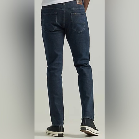 extreme motion slim straight leg jeans